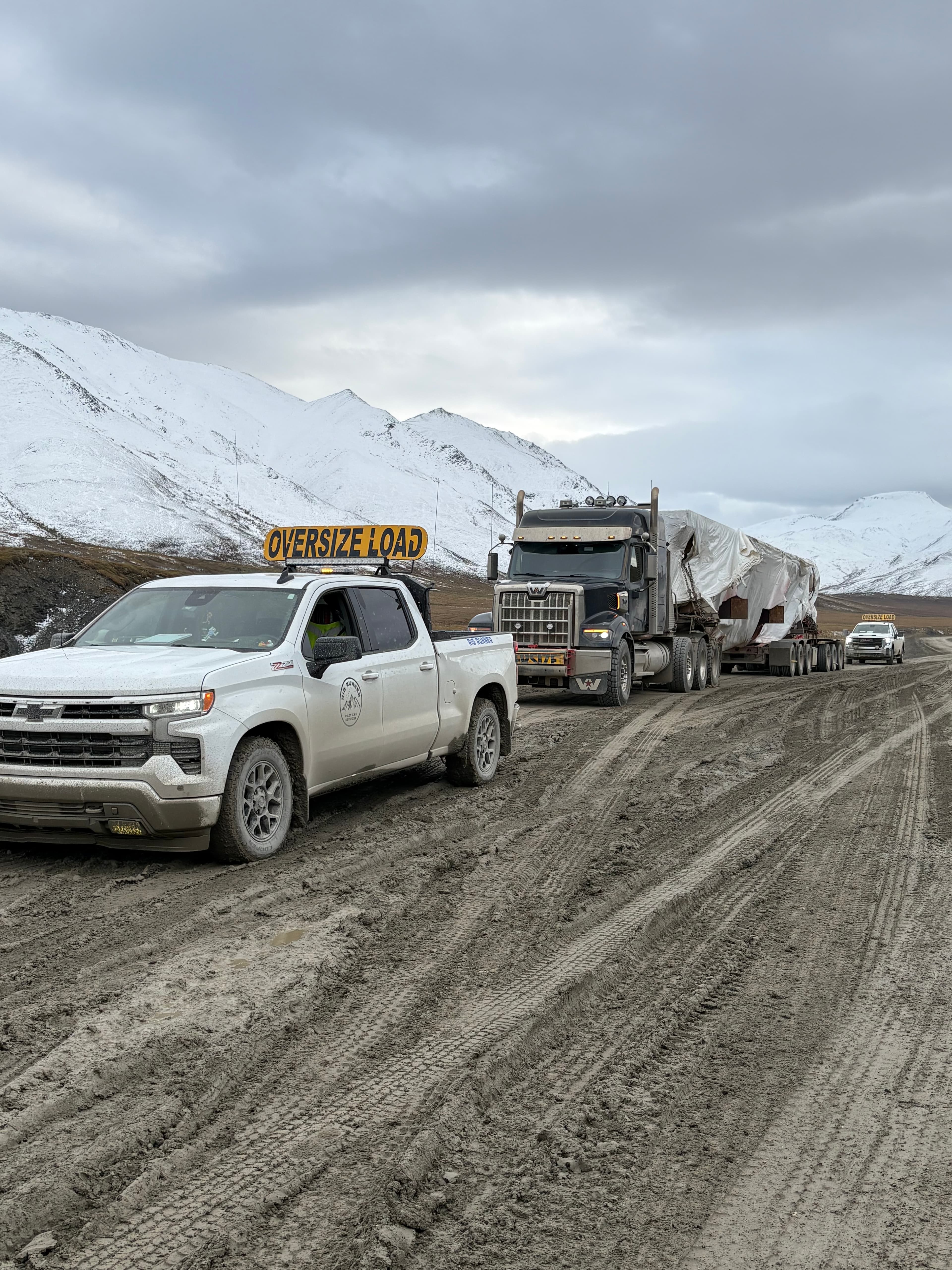 From Rig Runner’s Alaska work photo collection: oversize load escort on the road