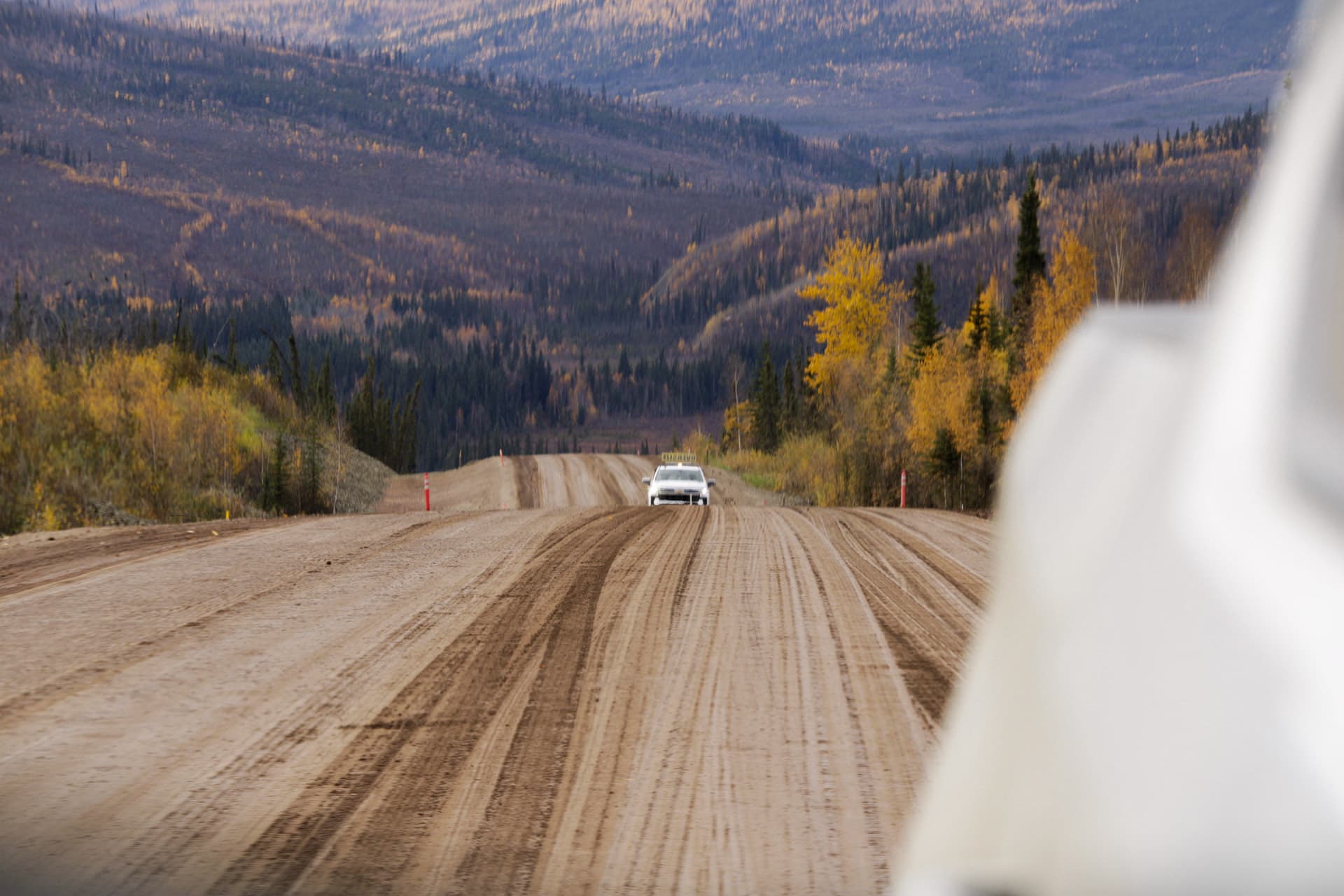 From Rig Runner’s Alaska work photo collection: oversize load escort on the road