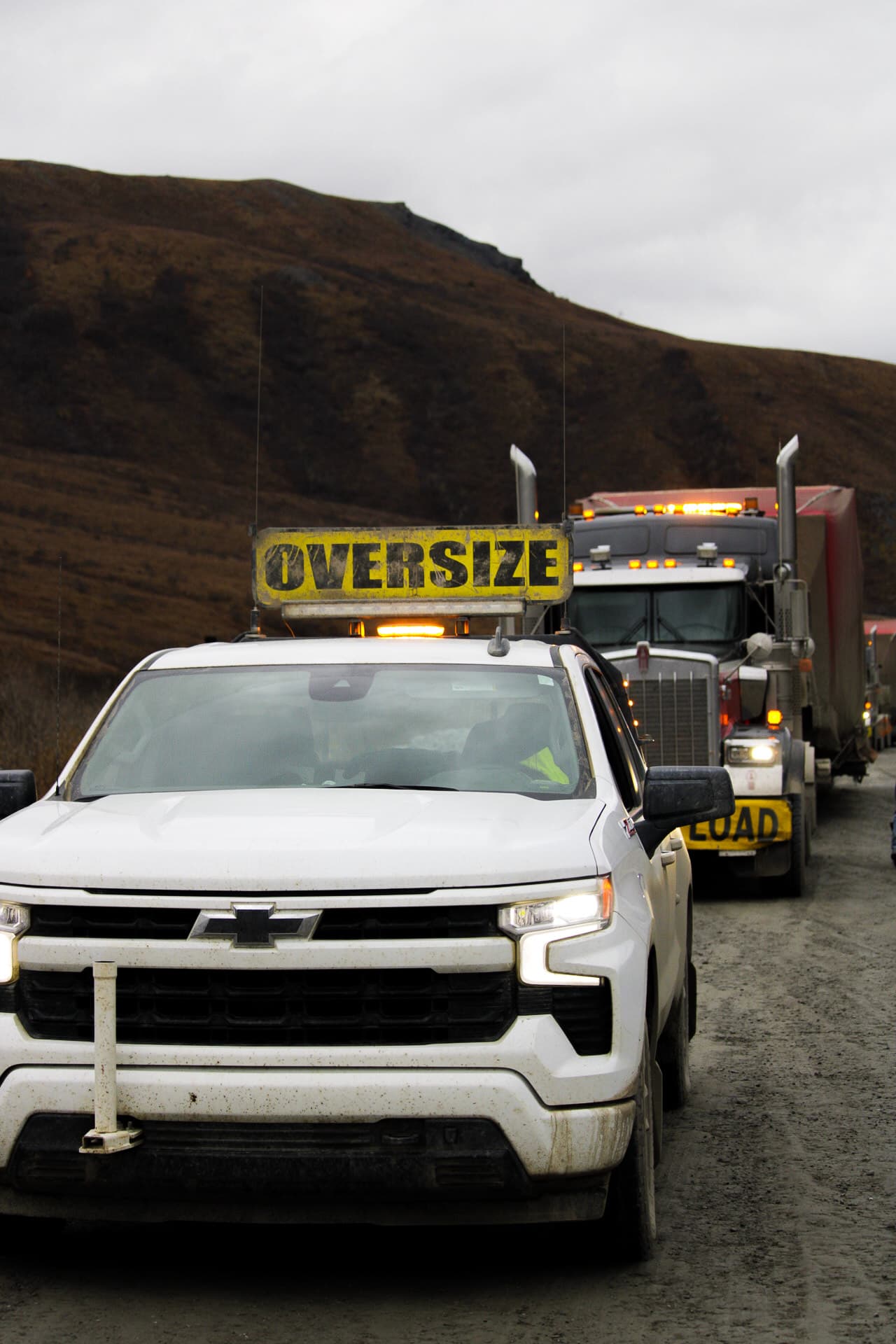 From Rig Runner’s Alaska work photo collection: oversize load escort on the road